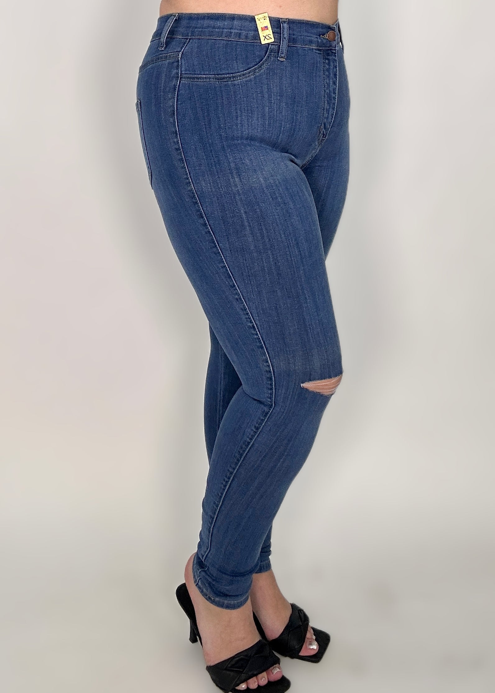 ‘Vibrant Skinny Knee Slit Jeans