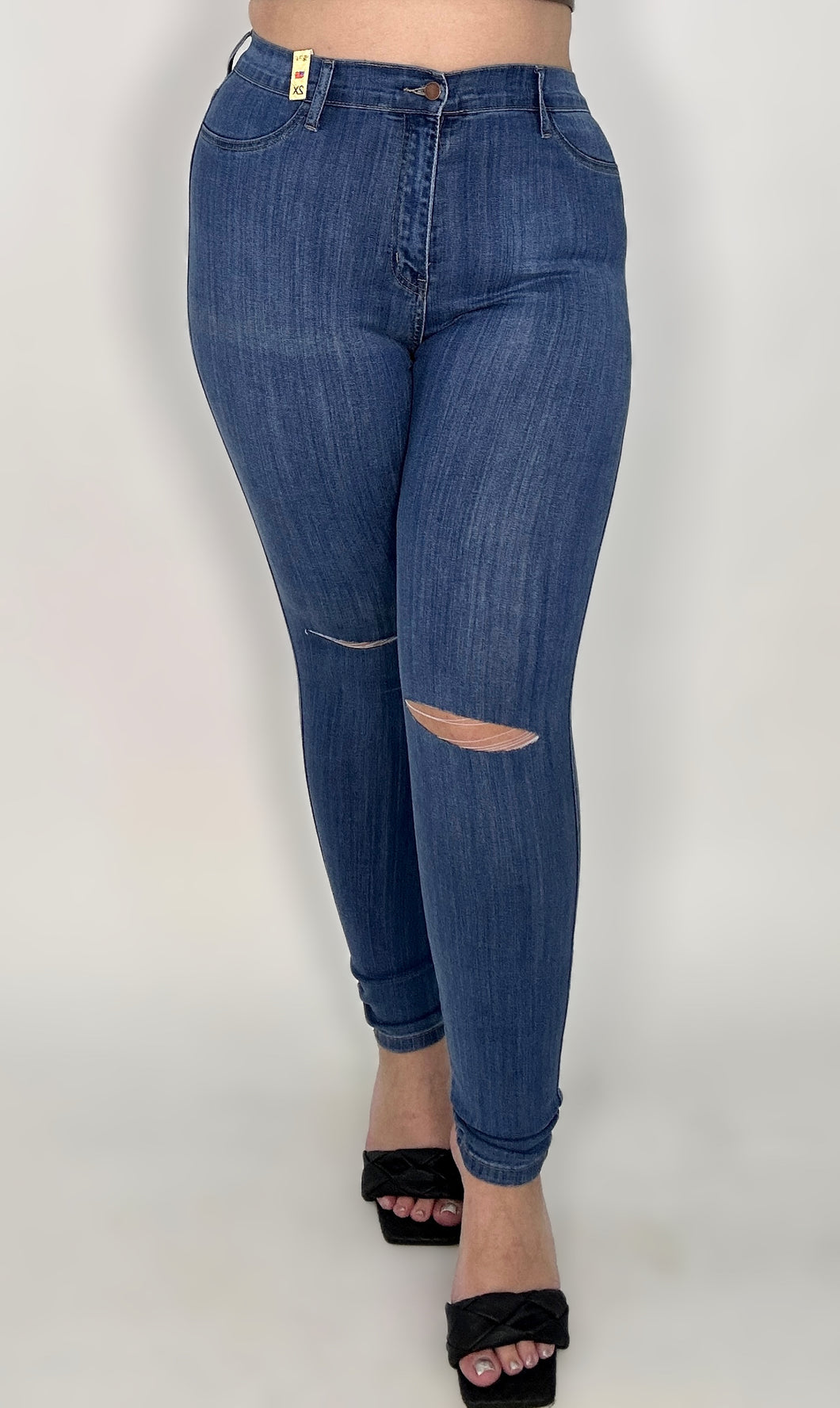 ‘Vibrant Skinny Knee Slit Jeans